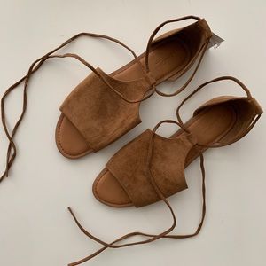 Brown suede lace-up flats